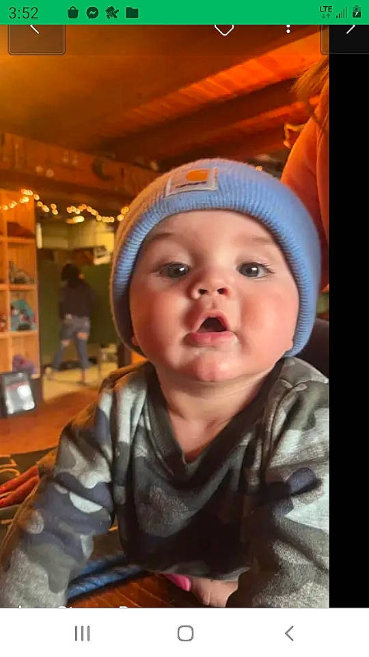 Slade joined the competition — help win amazing prizes! baby, baby_toddler_clothing, beanie, cap, chair, cheek, child, fun, happy, headgear, headwear, helmet, hoodie, nose, person, portrait_photography, room, sitting, toddler, vacation