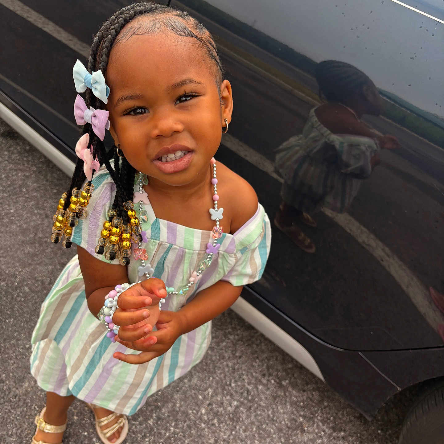 Azilah is registered to the contest to win money with this photo: alloywheel, bodypart, car, carwheel, child, face, female, finger, girl, hand, head, machine, person, photography, portrait, sitting, spoke, tire, transportation, vehicle