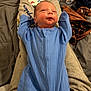 Demetry is registered to the contest to win money with this photo: baby, bed, blanket, blue_onesie, child, clothing, comfort, cute, fabric, home, indoor, infant, lap, legs, newborn, person, relaxing, sleepwear, soft, warm