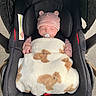 baby, infant, car_seat, blanket, pacifier, hat, striped_clothing, sleeping, cute, child, teddy_bear_pattern, cozy, outdoor, safety, headwear, newborn, resting, adorable, baby_boy, comfort