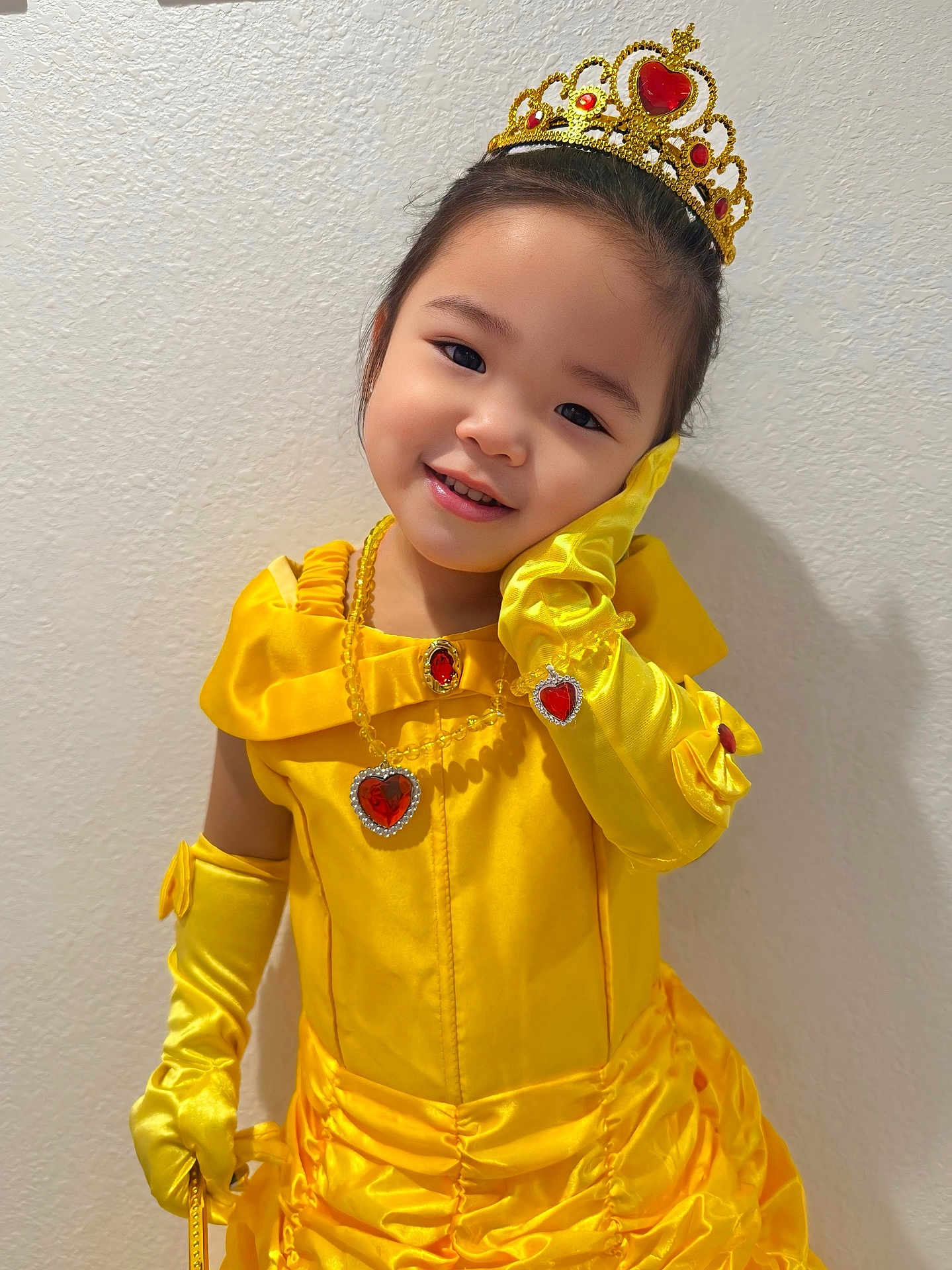 Sophia is registered to the contest to win money with this photo: child, girl, princess, yellow_dress, gloves, tiara, jewelry, smile, portrait, costume, indoor, pose, happy, cute, fashion, young, celebration, dress_up, accessories, playful
