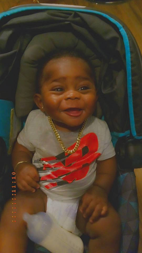 Cartier is registered to the contest to win money with this photo: baby, baby_products, baby_toddler_clothing, car_seat, chair, cheek, child, comfort, event, facial_expression, fun, hairstyle, happy, iris, mouth, nose, person, sitting, skin, smile