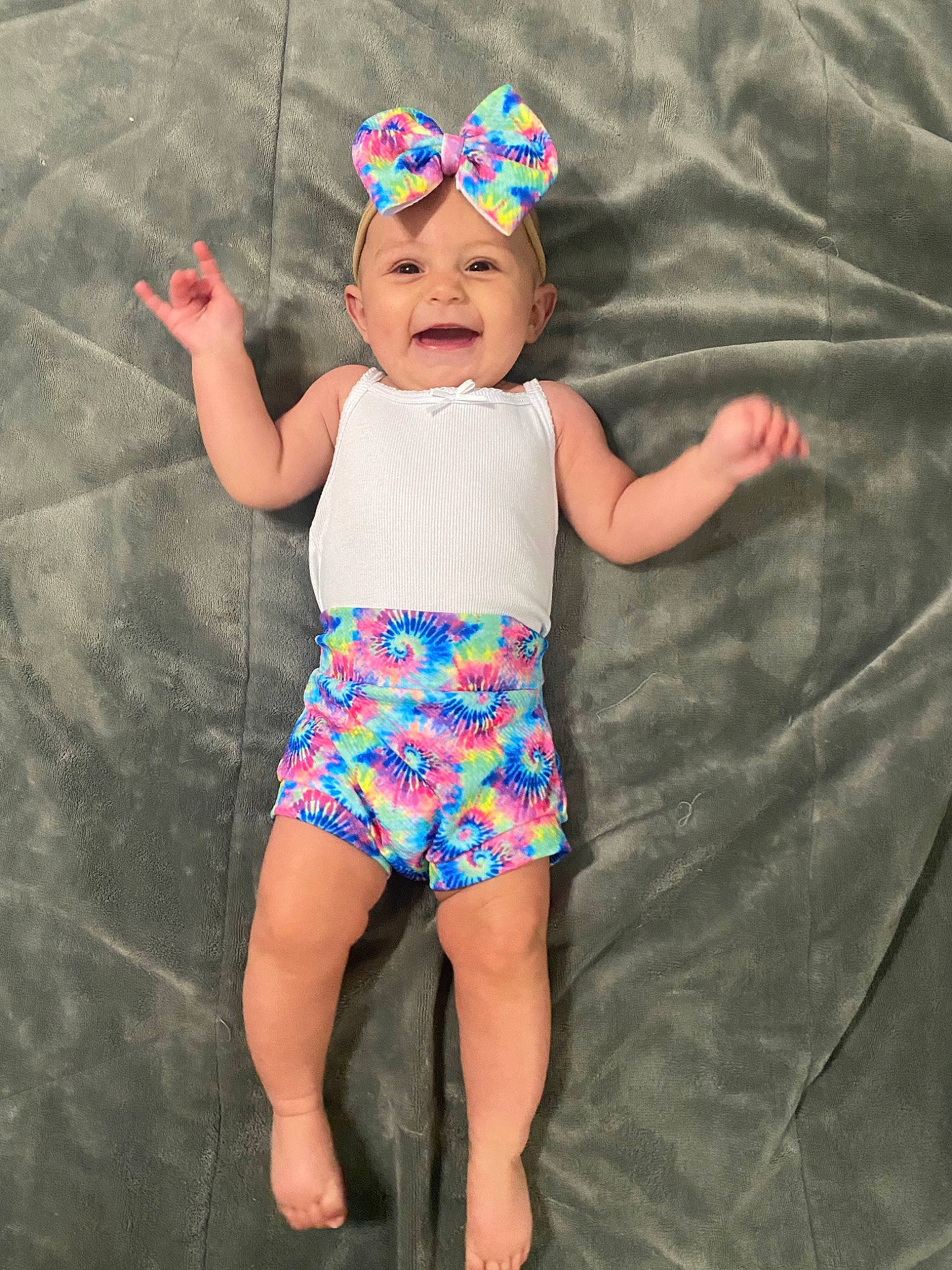 Harlow joined the competition — help win amazing prizes! azure, baby_toddler_clothing, cool, electric_blue, eye, eyewear, face, fun, happy, head, headwear, pattern, person, pink, shorts, sleeve, swimwear, t_shirt, thigh, toddler