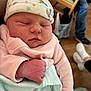 Arizona joined the competition — help win amazing prizes! newborn, baby, sleeping, infant, hat, clothing, hand, fist, indoors, person, cute, pastel_colors, blanket, resting, soft, face, peaceful, closeup, human, child