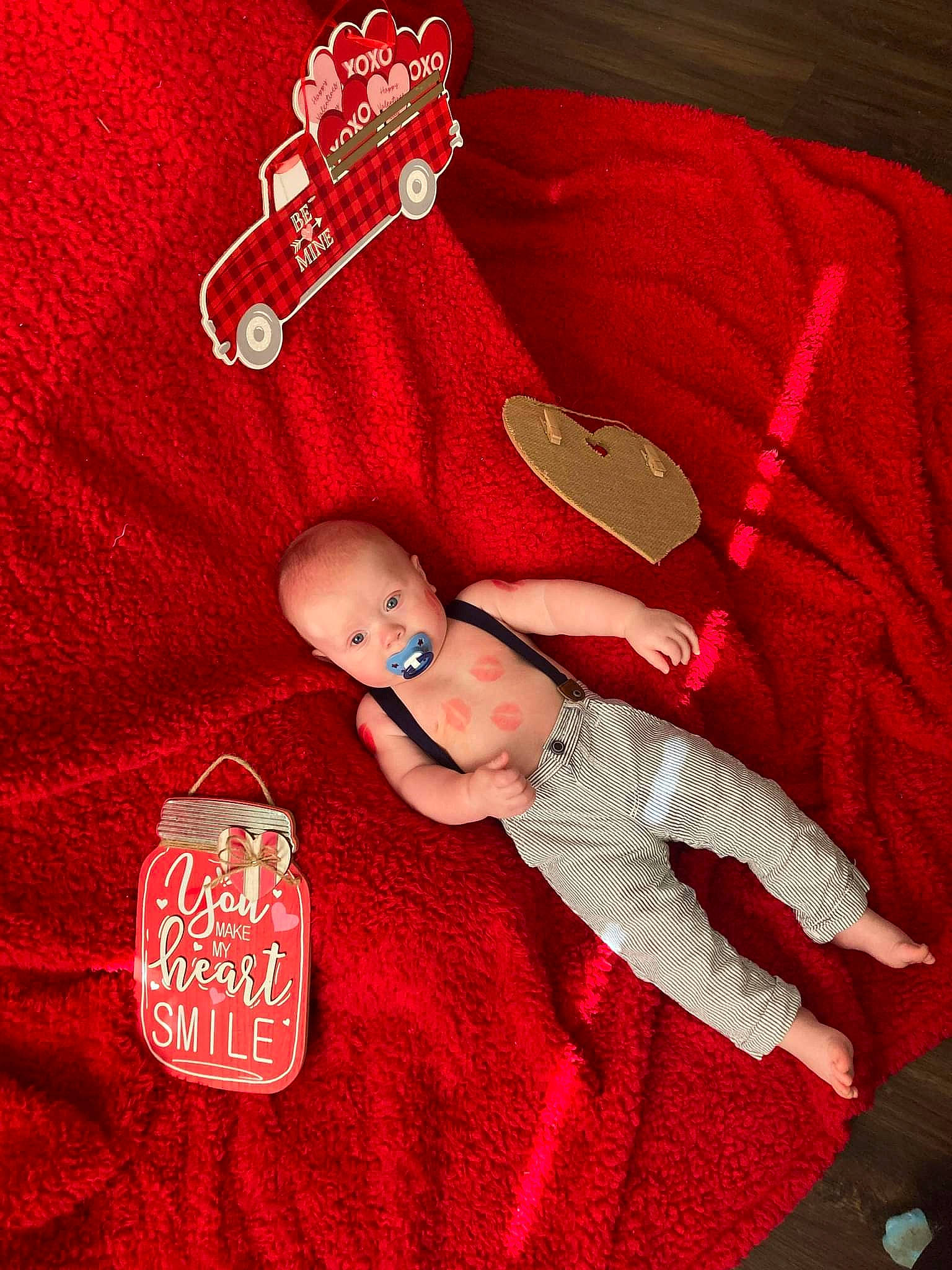 Samuel Mason joined the competition — help win amazing prizes! baby, baby_products, baby_toddler_clothing, carmine, christmas, comfort, fashion_accessory, fictional_character, finger, font, hand, holiday, linens, magenta, pattern, person, red, sleeve, t_shirt, textile