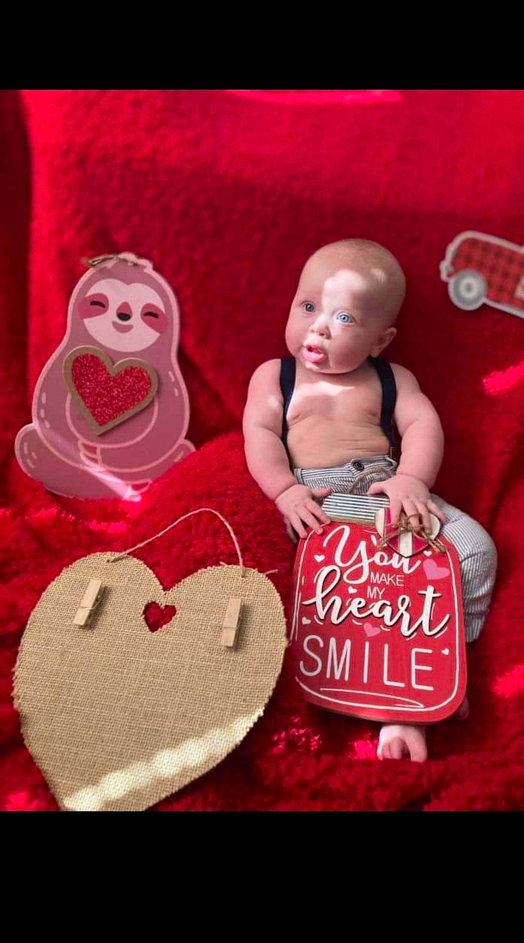 Samuel Mason is registered to the contest to win money with this photo: baby, baby_products, baby_toddler_clothing, baby_toys, carmine, child, doll, event, facial_expression, font, happy, magenta, mammal, person, pink, plush, room, sitting, stuffed_toy, sweetness