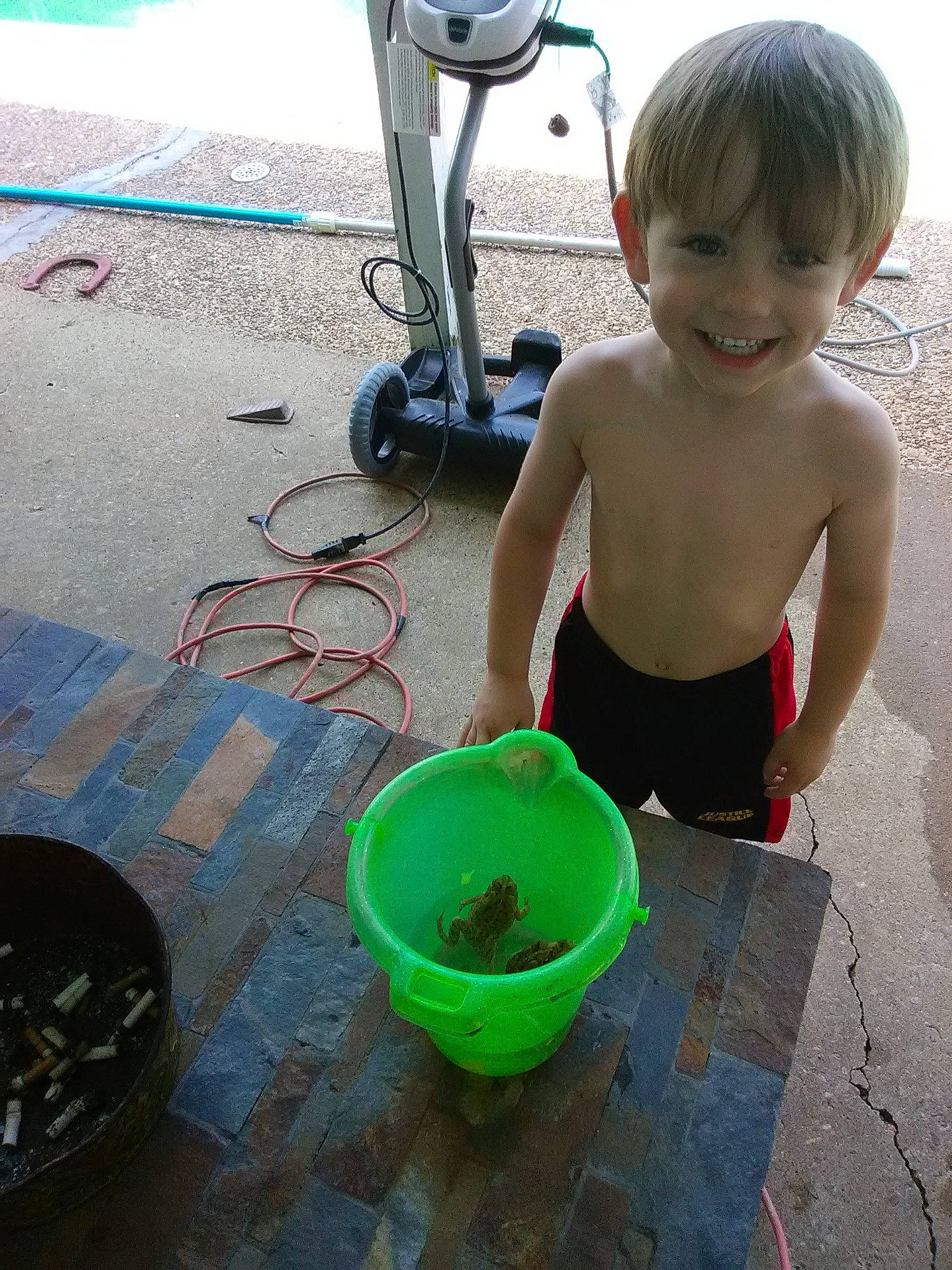 Ryley is registered to the contest to win money with this photo: bucket, child, joy, person, play, toddler, washing, water