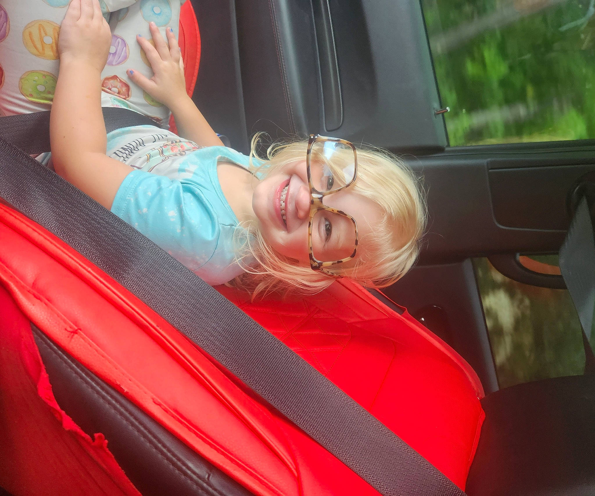 Gracelynn is registered to the contest to win money with this photo: auto_part, automotive_design, automotive_exterior, automotive_window_part, car, car_seat, eyewear, happy, joy, leisure, mode_of_transport, motor_vehicle, mouth, person, personal_luxury_car, smile, steering_wheel, thigh, vehicle, vehicle_door