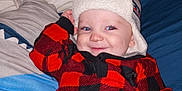 Kaleb is registered to the contest to win money with this photo: baby, beanie, blanket, bodypart, bonnet, cap, clothing, coat, couch, face, finger, fleece, hand, hat, head, knitwear, person, photography, portrait, sweater