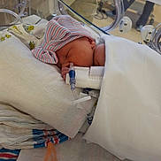 Kaylee joined the competition — help win amazing prizes! newborn, baby, hospital, incubator, medical_tubes, blanket, hat, sleeping, pacifier, healthcare, infant, care, bed, wrapped, patient, cute, resting, child, tiny, soft