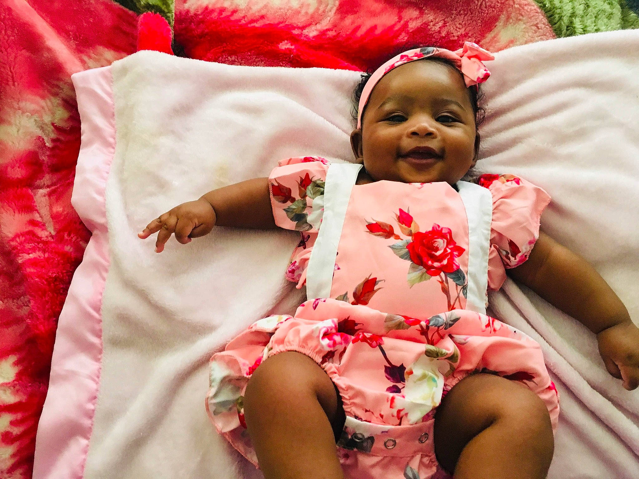 Janayah is registered to the contest to win money with this photo: baby, cheek, child, linens, lip, person, pink, skin, textile, toddler