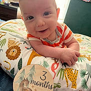 Cain joined the competition — help win amazing prizes! baby, infant, smiling, face, eyes, hands, striped_clothing, pillow, animal_print, lying_down, indoors, window, decor, cute, child, happy, portrait, young, three_months, soft_lighting