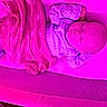 Everleigh joined the competition — help win amazing prizes! baby, infant, sleeping, crib, blanket, swaddled, clothing, patterned_fabric, portrait, face, closed_eyes, peaceful, indoors, nursery, pink, magenta, neon_lighting, bed, mesh, resting