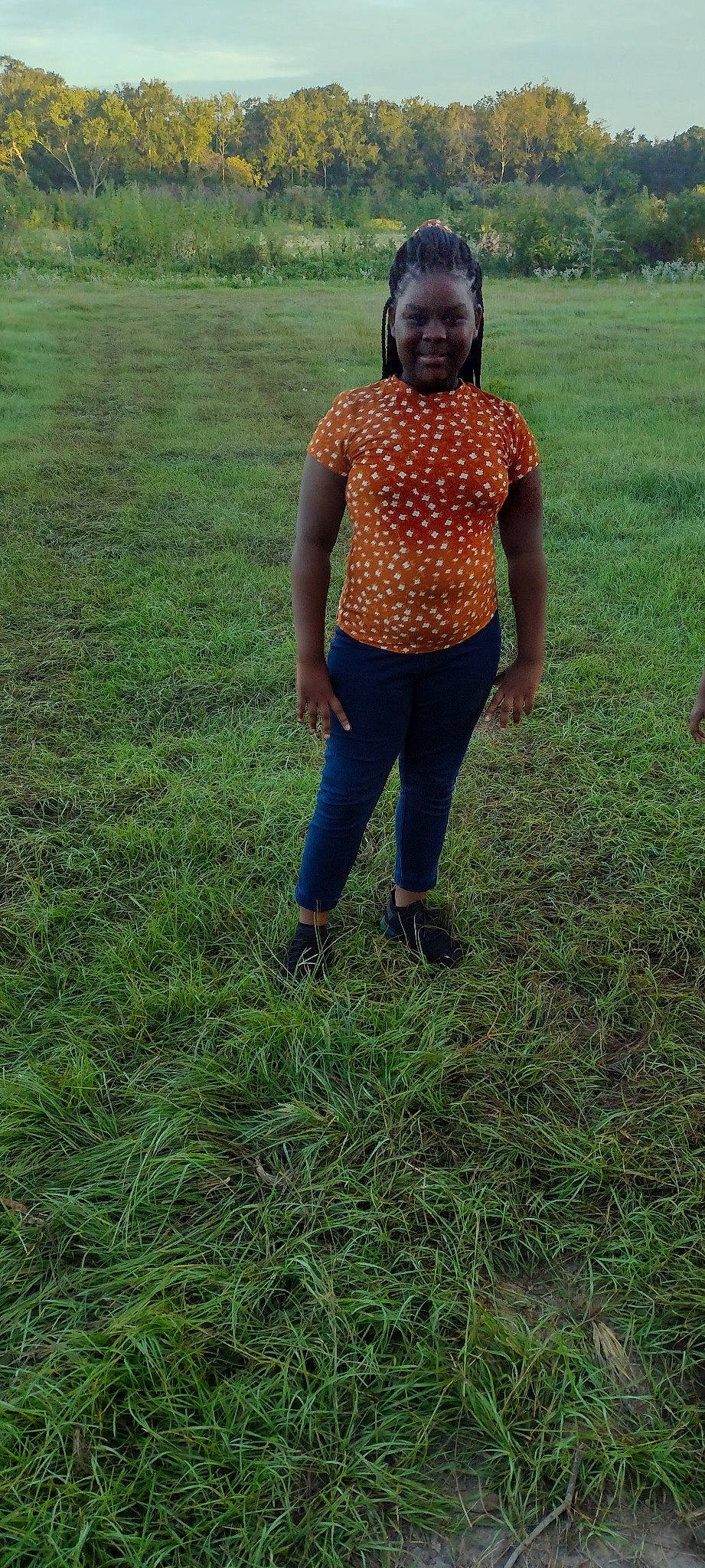 Jameica is registered to the contest to win money with this photo: adaptation, boot, fun, grass, grassland, groundcover, hairstyle, happy, human_leg, joy, knee, landscape, leisure, meadow, pasture, people_in_nature, person, plant, prairie, soil