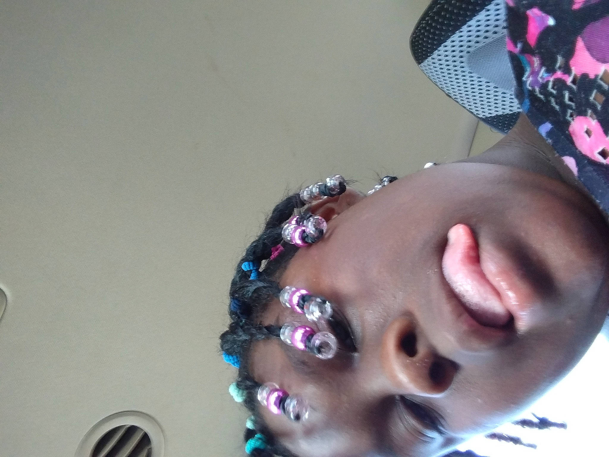 Jameica is registered to the contest to win money with this photo: audio_equipment, beauty, black_hair, cheek, cool, eyelash, eyewear, finger, fun, hair_accessory, head, headgear, jaw, lip, mouth, neck, nose, pink, purple, vision_care