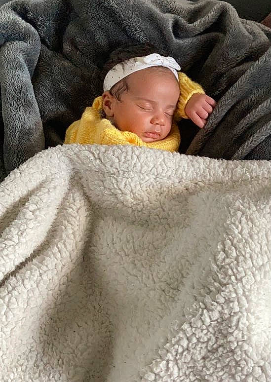 Stella participe au concours pour gagner de l'argent avec cette photo : baby, baby_sleeping, baby_toddler_clothing, bedding, bedtime, cheek, child, comfort, face, fur, hat, linens, nap, person, room, skin, sleep, sleeve, toddler, towel