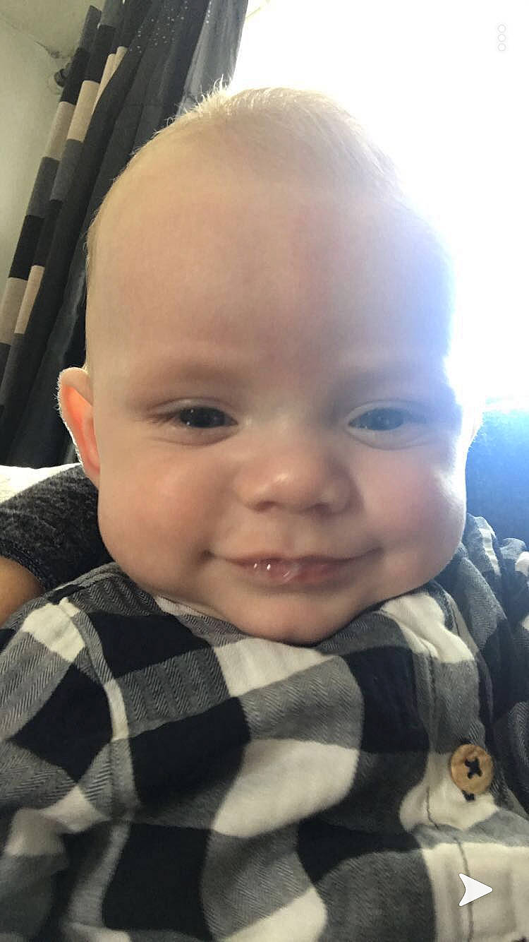 Bear is registered to the contest to win money with this photo: baby, cheek, child, chin, cool, ear, eye, eyebrow, face, facial_expression, forehead, hair, head, lip, mouth, nose, person, selfie, skin, smile