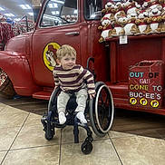 Sawyer joined the competition — help win amazing prizes! beaver_logo, cartoon_logo, casual_wear, child, clothing, happy, holiday_merchandise, indoor, light_reflection, person, plush_toys, red_truck, retail, smiling, store_interior, tiled_floor, toy_display, wheelchair, wheelchair_user, young_child