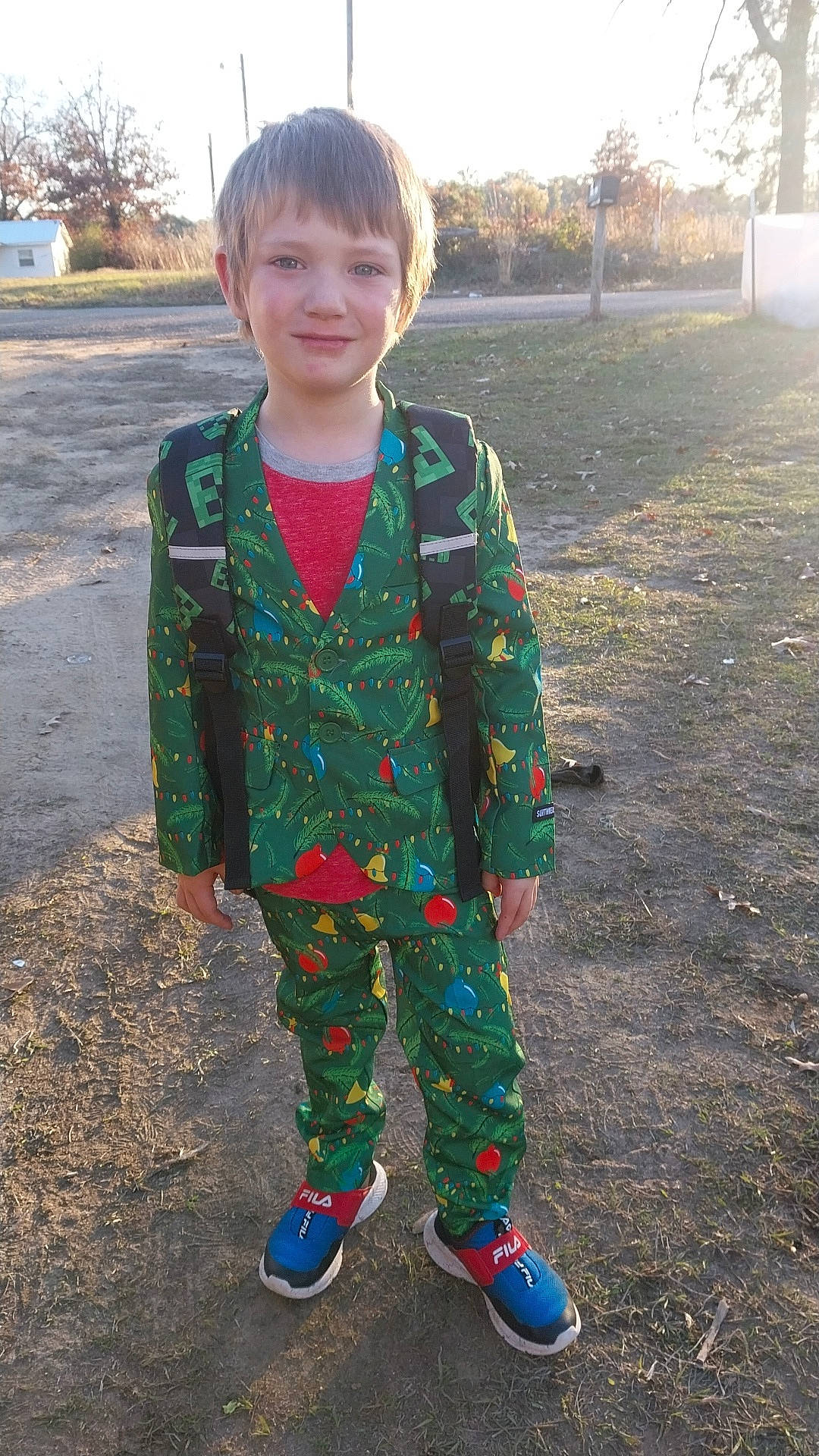 Kyson joined the competition — help win amazing prizes! blazer, child, cool, formal_wear, fun, grass, happy, joy, pajamas, pattern, people_in_nature, person, plant, play, sleeve, smile, soil, suit, textile, toddler