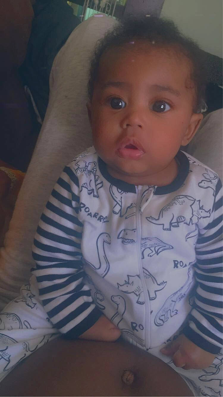 Jakari is registered to the contest to win money with this photo: black, cheek, chin, comfort, ear, eye, eyebrow, forehead, gesture, hairstyle, human_body, iris, jaw, lip, mouth, neck, nose, person, skin, sleeve