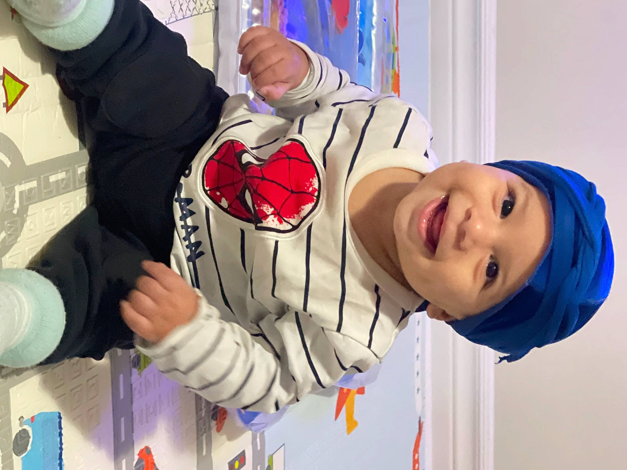 Aydan joined the competition — help win amazing prizes! arm, carmine, child, event, fictional_character, fun, gesture, glove, hand, happy, headwear, joy, leisure, pattern, person, play, room, smile, toddler, window