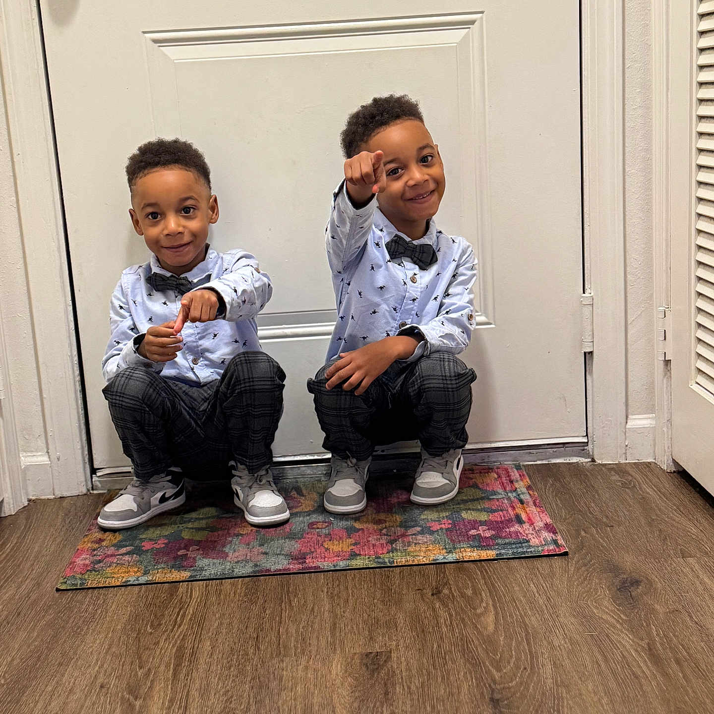 Drasi-Draycko is registered to the contest to win money with this photo: boy, child, clothing, door, face, footwear, hardwood, head, homedecor, indoors, interiordesign, jeans, male, pants, person, photography, portrait, shoe, sitting, wood