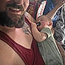 Castiel joined the competition — help win amazing prizes! man, baby, sleeping, pacifier, woman, smiling, tattoo, tank_top, indoor, snack_bags, remote_control, family, close_up, person, casual, relaxed, home, couch, blanket, resting