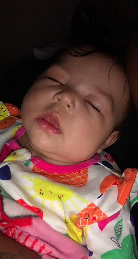 Khalani is registered to the contest to win money with this photo: baby, baby_toddler_clothing, cheek, child, chin, close_up, eyebrow, eyelash, facial_expression, fun, happy, iris, jaw, lip, mouth, neck, nose, person, pink, skin