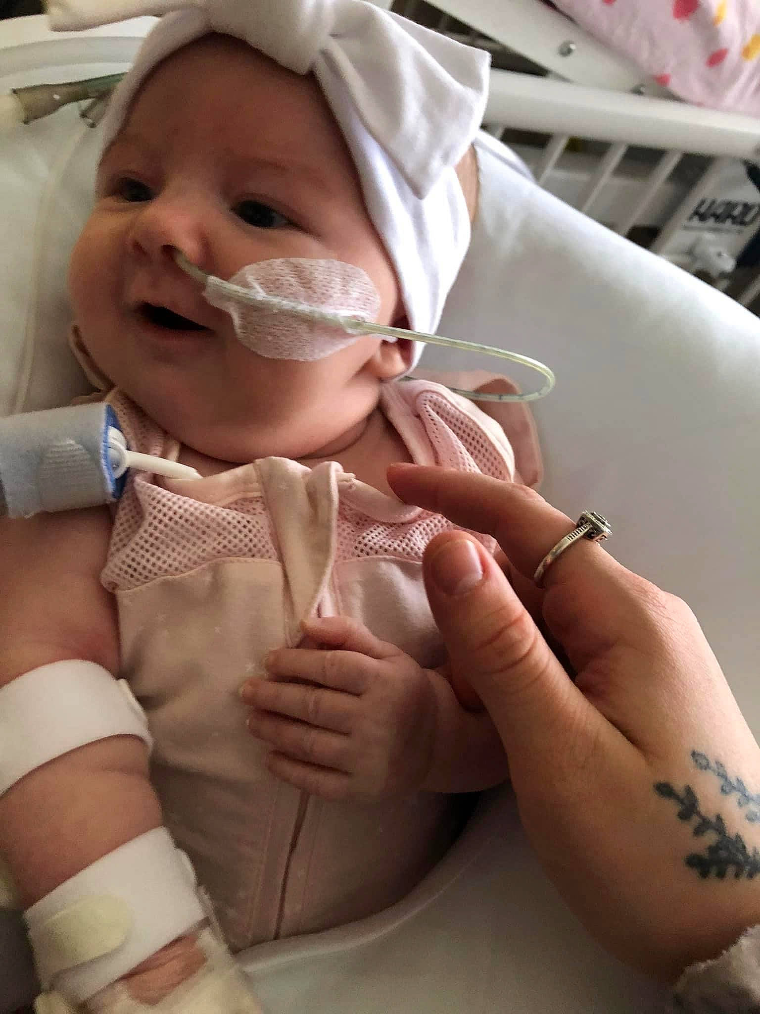 Sadie joined the competition — help win amazing prizes! baby, cheek, comfort, eyebrow, eyelash, finger, gesture, hand, headwear, health_care, joint, medical_equipment, mouth, nail, nose, person, service, skin, smile, thumb