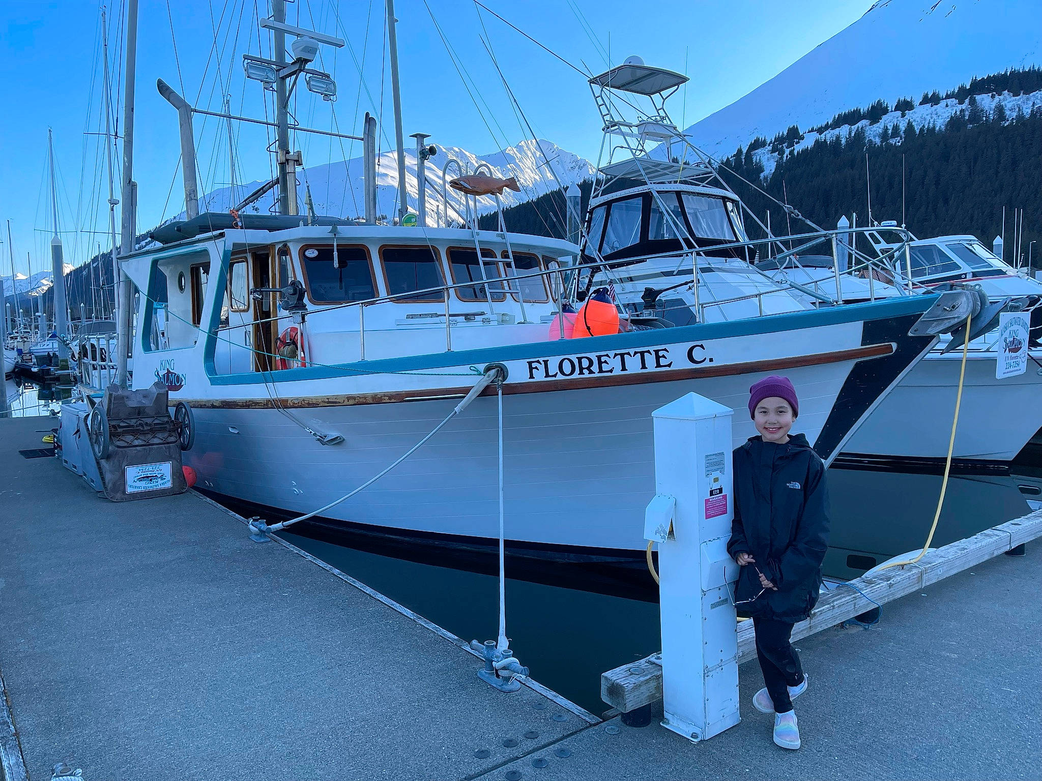 Rosa joined the competition — help win amazing prizes! boat, boating, boats_and_boating_equipment_and_supplies, deck, dock, electric_blue, harbor, headwear, joy, marina, mast, naval_architecture, person, port, sailboat, ship, skiff, sky, slope, vehicle