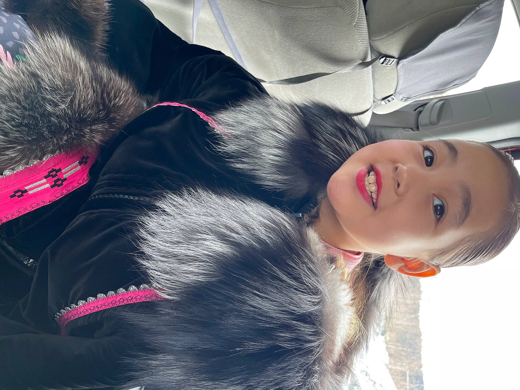 Rosa is registered to the contest to win money with this photo: companion_dog, dog_breed, eye, eyelash, fashion_accessory, feather, fun, fur, fur_clothing, human_leg, joy, magenta, person, selfie, skin, thigh