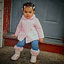 boots, child, concrete, confident, cute, door, doorstep, fashion, fur_trim, hair_clips, jeans, outdoor, pink_coat, portrait, serious_expression, standing, toddler, winter_boots, winter_clothing, young_child
