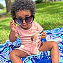 Kehlani joined the competition — help win amazing prizes! barefoot, blanket, child, curly_hair, cute, fashion, feather, grass, heart_shaped_glasses, nature, outdoor, patterned_blanket, pink_clothing, playful, portrait, sitting, summer, sunglasses, sunny, toddler
