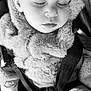 Myliana participe au concours pour gagner de l'argent avec cette photo : child, toddler, sleeping, car_seat, seatbelt, fuzzy_jacket, black_and_white, close_up, cozy, peaceful, hand, face, eyelashes, clothing, nap_time, infant, portrait, indoor, baby, cute