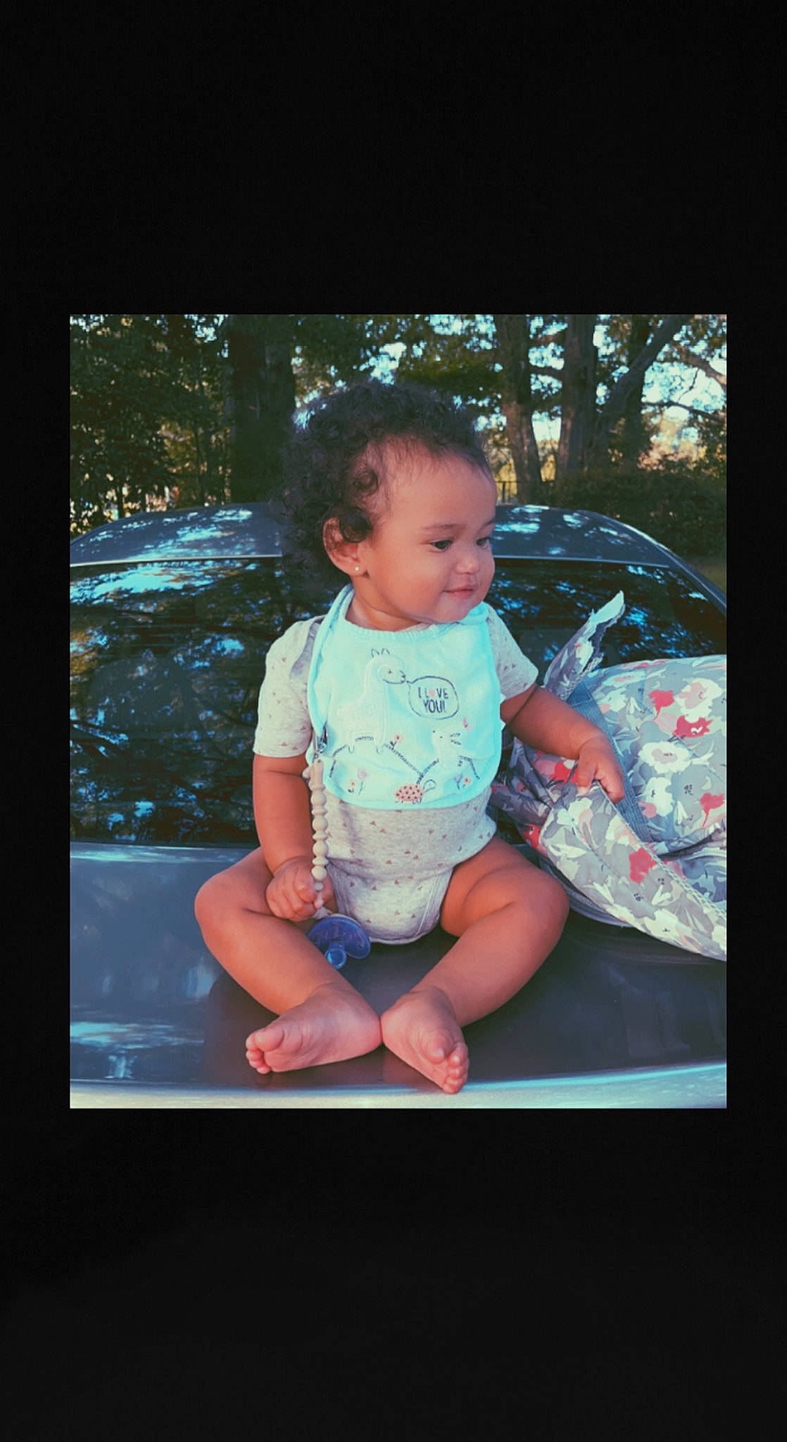 Elayna is registered to the contest to win money with this photo: baby, baby_toddler_clothing, barefoot, child, darkness, display_device, electric_blue, flash_photography, foot, fun, glass, happy, leisure, person, sitting, sleeve, t_shirt, tints_and_shades, toddler, tree