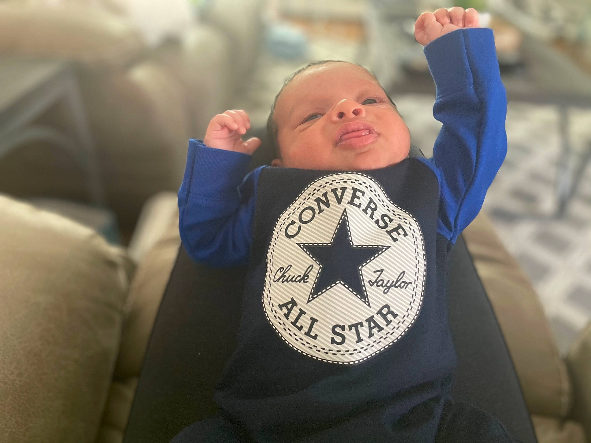 Liam is registered to the contest to win money with this photo: baby, baby_sleeping, cap, carmine, child, comfort, cross, electric_blue, event, flag, fun, gesture, happy, linens, person, sleeve, symbol, t_shirt, thumb, toddler
