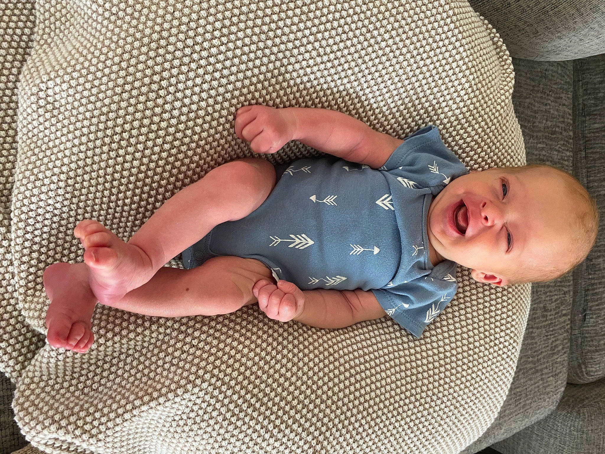 Hayes joined the competition — help win amazing prizes! baby, baby_products, baby_sleeping, baby_toddler_clothing, comfort, finger, foot, hand, human_body, human_leg, leg, linens, pattern, person, skin, sleeve, smile, sock, textile, thigh