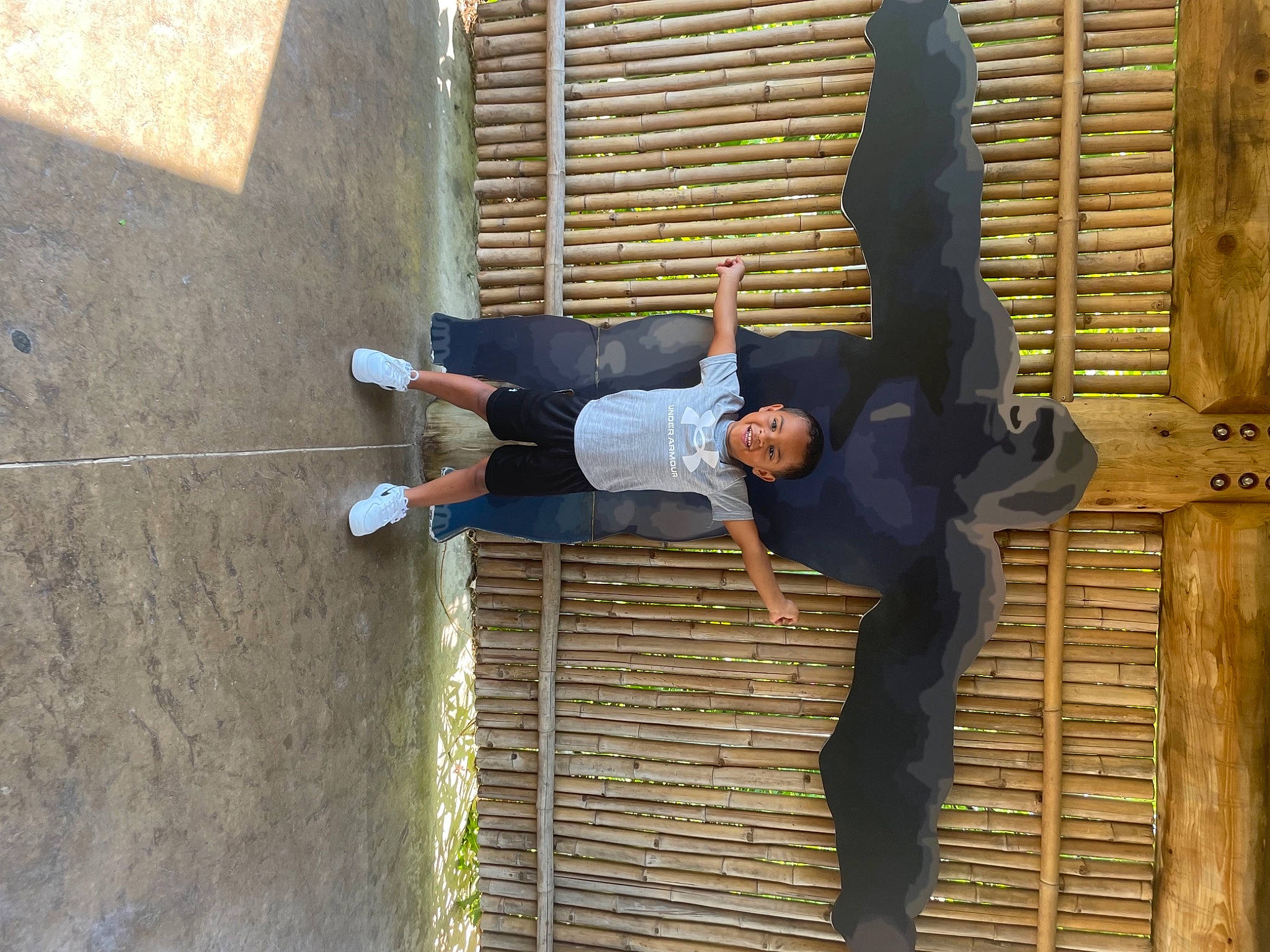 Lance joined the competition — help win amazing prizes! composite_material, concrete, elbow, facade, joy, knee, outdoor_shoe, person, sleeve, smile, street_fashion, t_shirt, thigh, waist, walking_shoe, wood, wrist