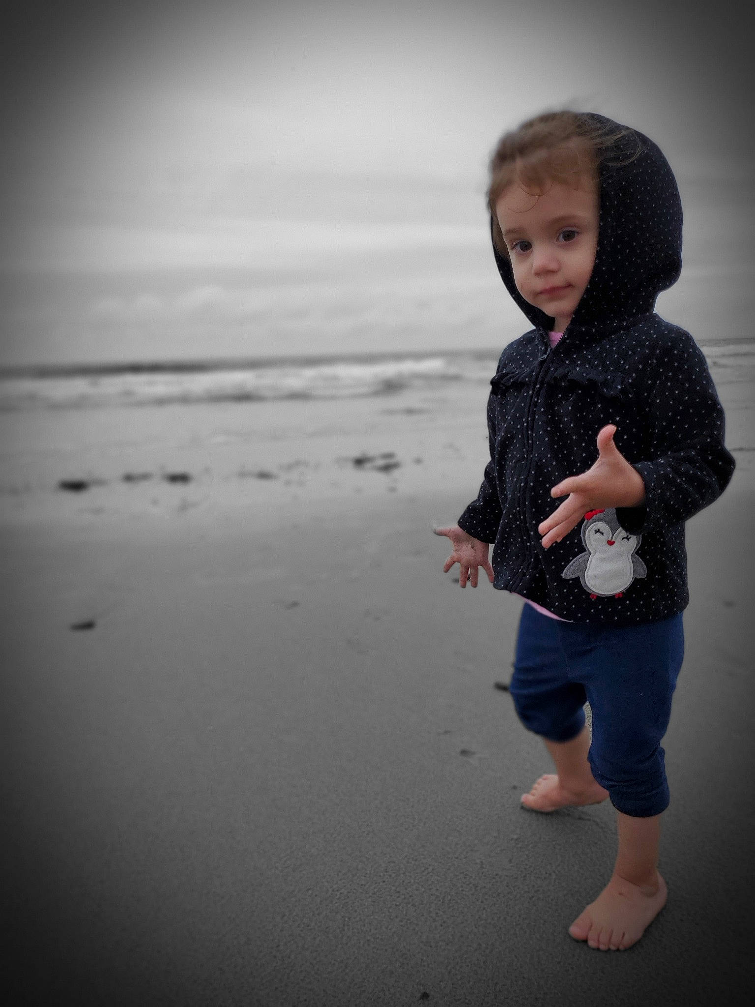 Kennidi is registered to the contest to win money with this photo: baby, beach, cheek, child, cloud, coast, flash_photography, fun, ocean, person, photography, play, reflection, sea, sky, smile, standing, toddler, vacation, water