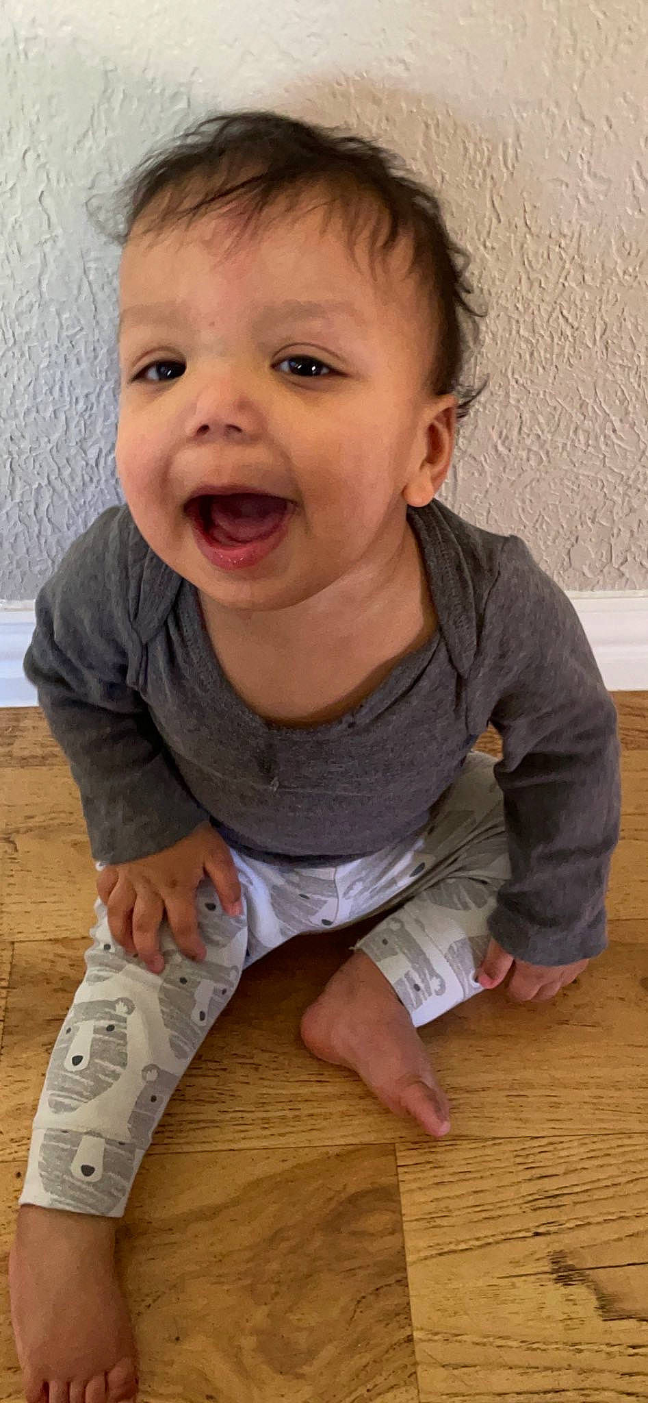 Damian joined the competition — help win amazing prizes! baby_toddler_clothing, cheek, child, chin, face, facial_expression, finger, floor, flooring, happy, head, human_body, iris, nose, person, skin, sleeve, smile, toddler, tooth