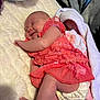 baby, newborn, infant, sleeping, blanket, diaper, pink_dress, lace, towel, bed, cozy, cute, peaceful, portrait, closeup, arm, leg, foot, soft_texture, nursery