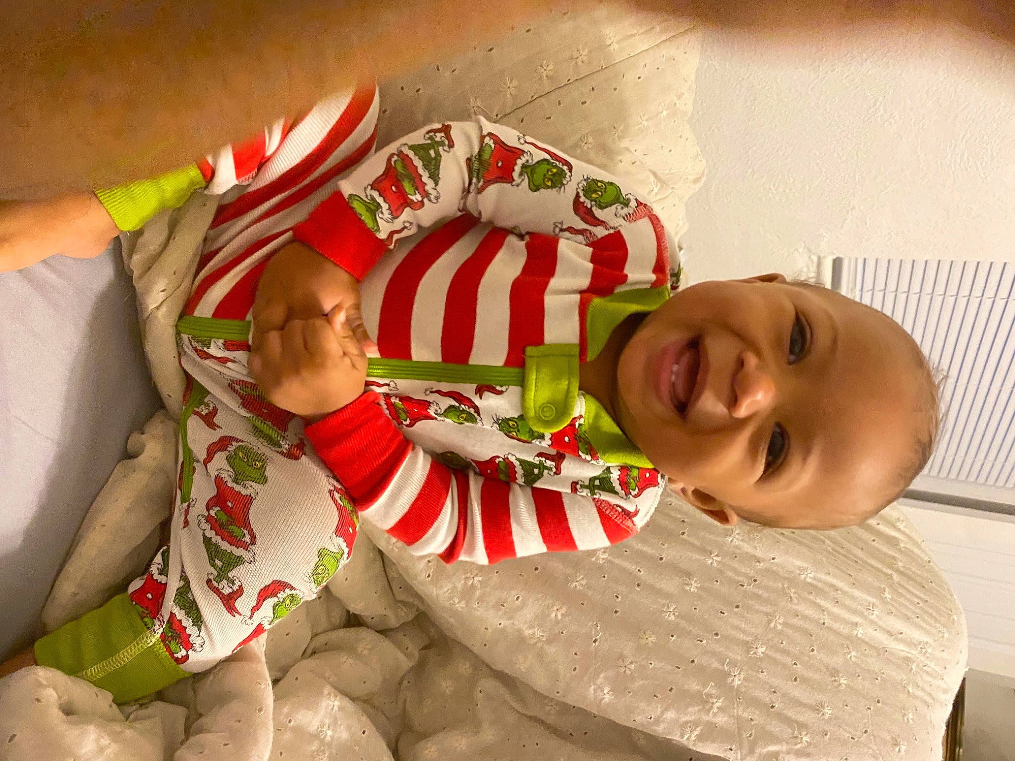 Jamal is registered to the contest to win money with this photo: baby, carmine, child, christmas, christmas_eve, comfort, event, finger, gesture, hand, happy, holiday, human_leg, lap, linens, person, santa_claus, sleeve, smile, textile