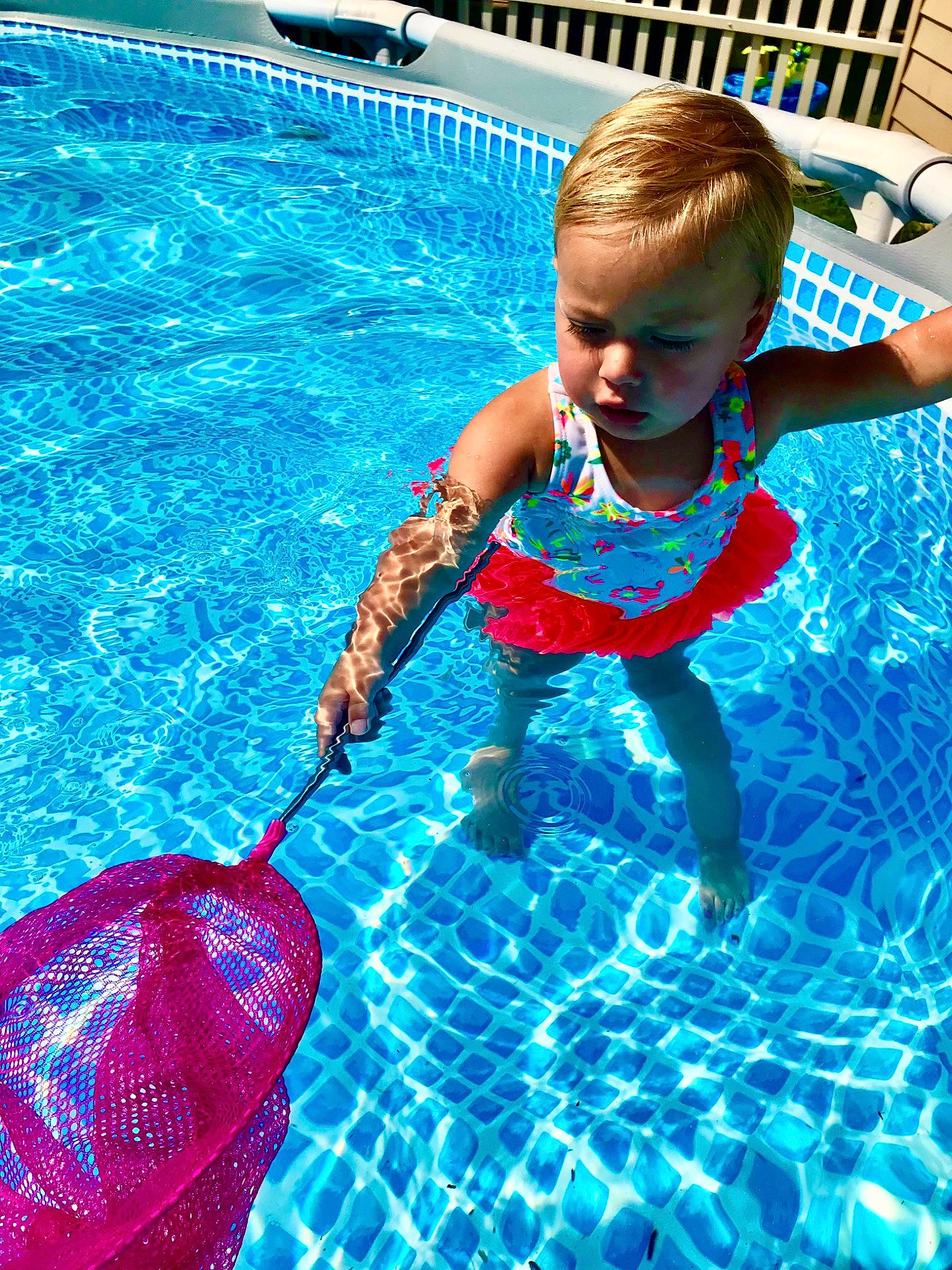 Charlee is registered to the contest to win money with this photo: azure, baby, blue, child, electric_blue, fashion_accessory, flooring, fun, games, happy, leisure, outdoor_recreation, person, personal_protective_equipment, play, recreation, sports, swimmer, swimming_pool, toddler
