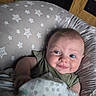 óðinn joined the competition — help win amazing prizes! baby, blanket, clothing, comfort, cozy, cushion, cute, expression, face, furniture, hand, head, home, indoor, infant, person, polka_dot, resting, smile, star_pattern