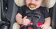 óðinn joined the competition — help win amazing prizes! baby, baby_accessory, baby_girl_or_boy, baby_toddler, black_shirt, blue_eyes, car_seat, child, child_safety, clothing, cute, footwear_free, indoors, infant, pacifier, portrait, red_pants, safety, seatbelt, smiling