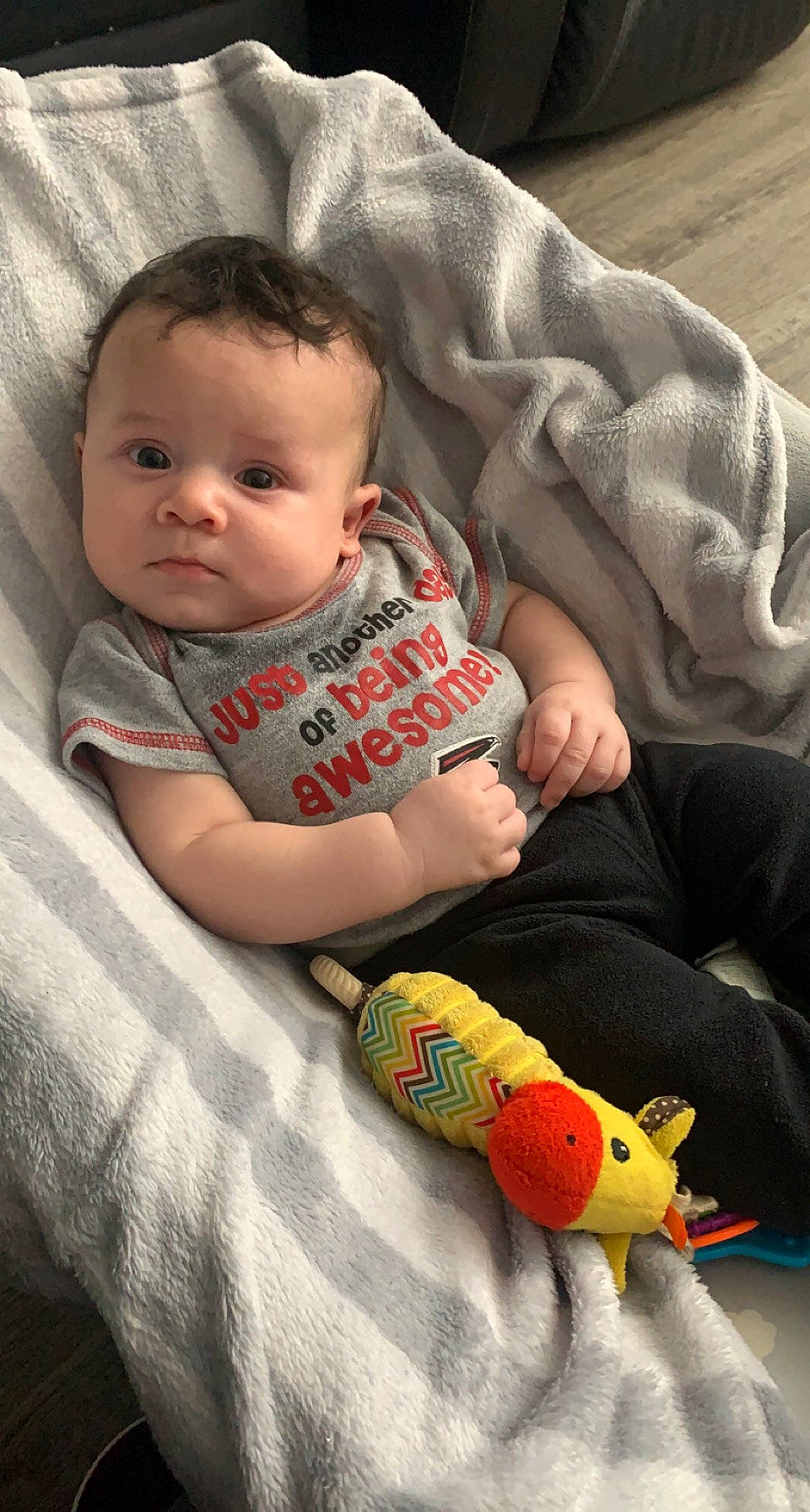 Leonel joined the competition — help win amazing prizes! arm, baby, baby_toddler_clothing, cheek, comfort, eye, face, hand, head, human_body, iris, mammal, mouth, nose, orange, organ, person, product, skin, textile