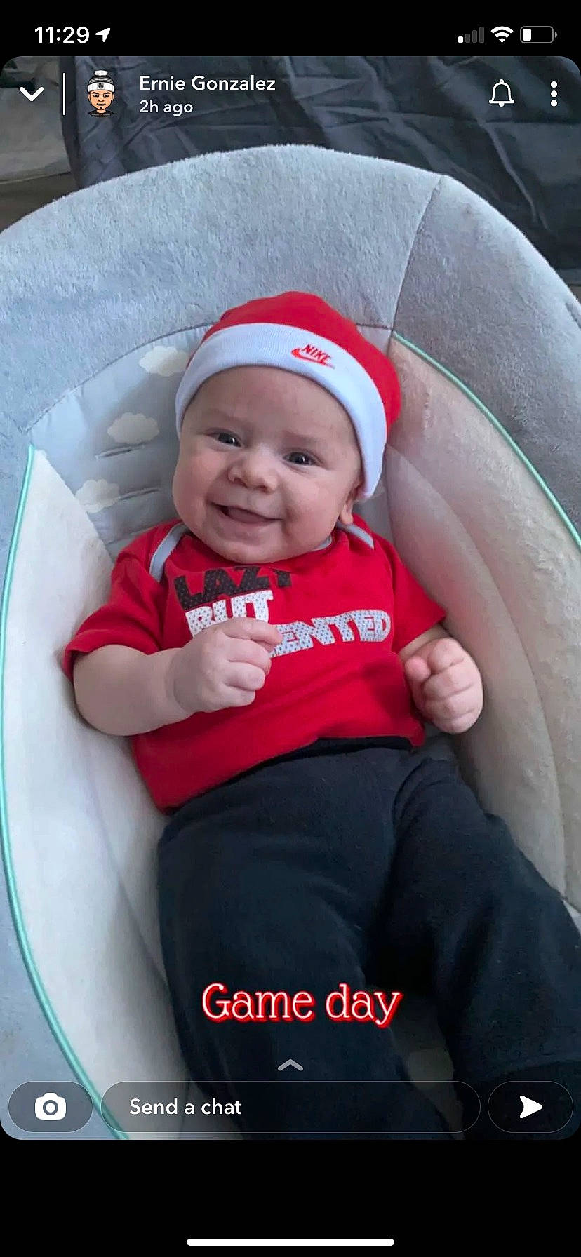 Leonel joined the competition — help win amazing prizes! baby, baby_toddler_clothing, cap, car_seat, child, clothing, comfort, face, fun, happy, hat, headwear, joy, lap, mammal, person, pink, product, sitting, skin