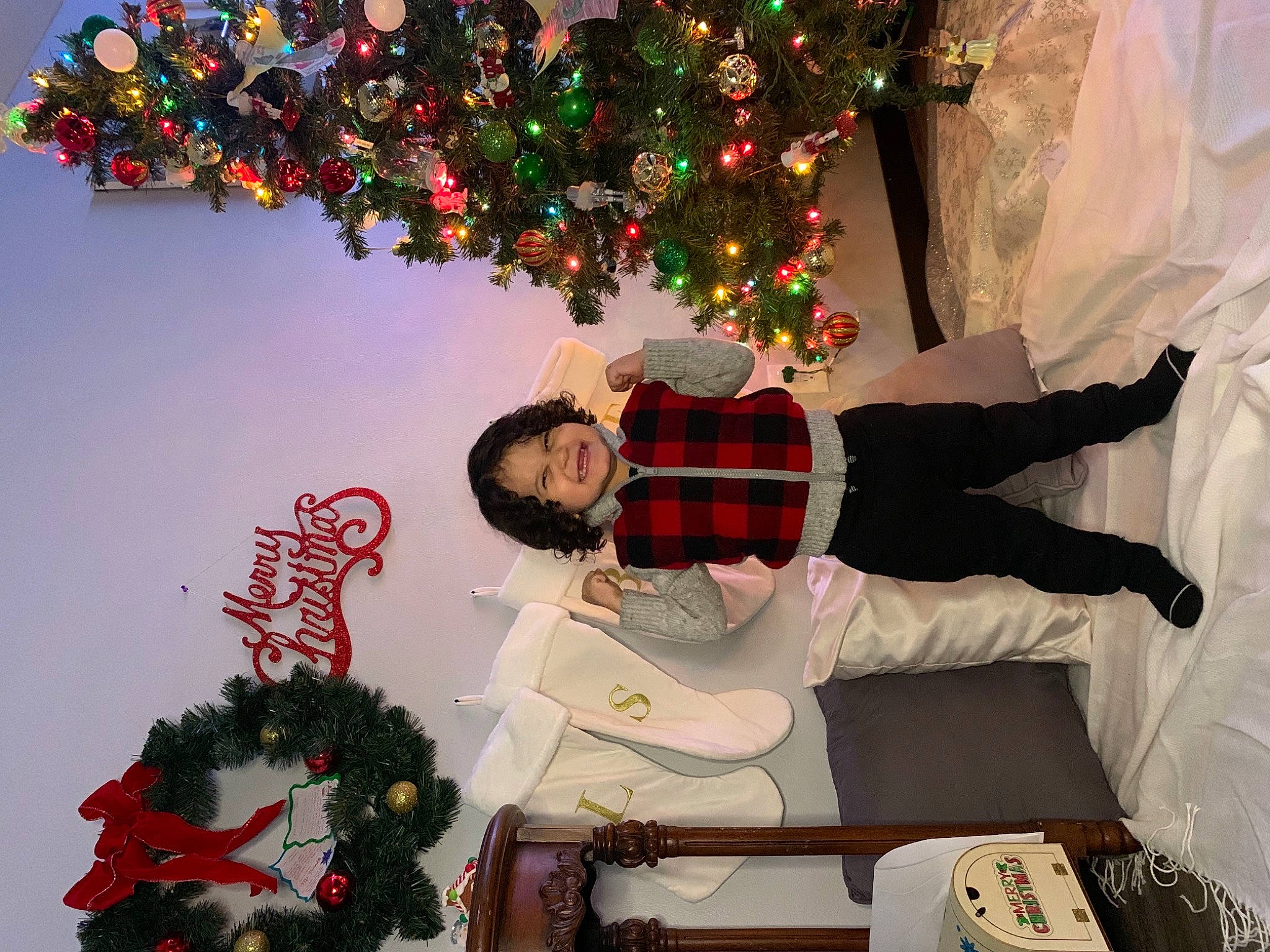 Sebastian joined the competition — help win amazing prizes! christmas, christmas_decoration, christmas_ornament, christmas_tree, decoration, event, fun, green, happy, holiday, holiday_ornament, interior_design, joy, light, ornament, person, photograph, plant, red, snapshot