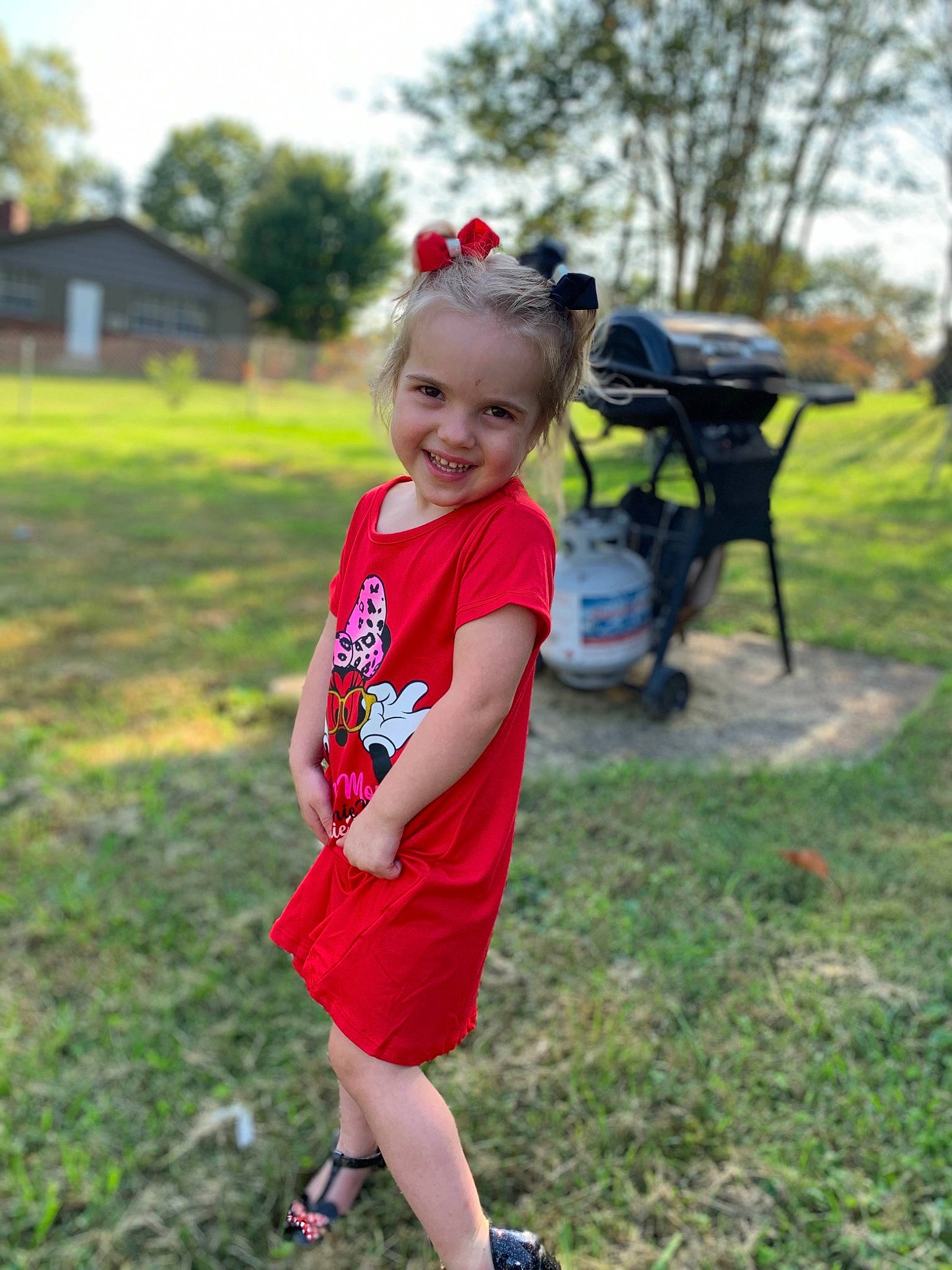 Athena is registered to the contest to win money with this photo: child, competition_event, fun, grass, grassland, happy, head, joy, leisure, luggage_and_bags, people_in_nature, person, plant, recreation, running, shorts, sky, soil, t_shirt, toddler