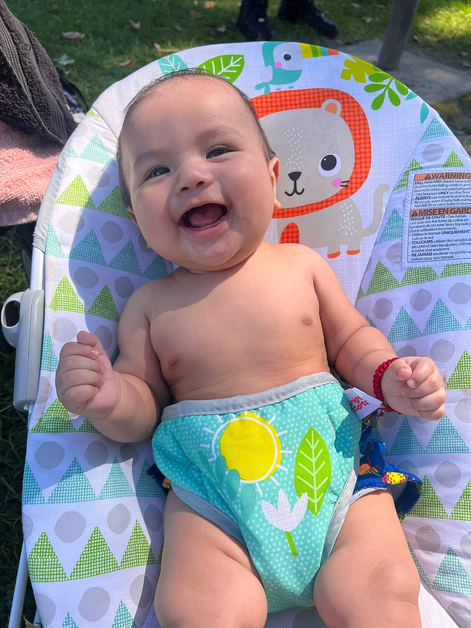 Elijah is registered to the contest to win money with this photo: baby, baby_products, baby_toddler_clothing, chair, chest, child, facial_expression, green, happy, infant_bodysuit, person, pink, product, skin, smile, stomach, swimwear, thigh, toddler, trunk